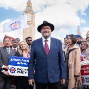 George Galloway speaking to the media during a press conference on Parliament Square