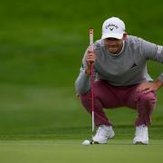 Nicolai Hojgaard looks over his putt on the second hole (Gregory Bull/AP)