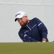Shane Lowry, of Ireland, hits out of a bunker on the 16th hole during the first round of the Phoenix Open (Ross D Franklin, AP)