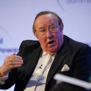 Andrew Neil has been called out for sharing a 'distasteful' cartoon