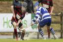 Oban’s Daniel Sloss, left, and Iain Robinson of Newtonmore during the Camanachd Cup final before it was abandoned