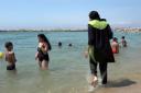 More violence has been committed by men in suits than by women in burkini. Photograph: AP