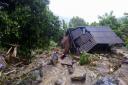 Flash floods damage a house in northern province of Hoa Binh, Vietnam, yesterday