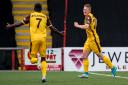 Wright stuff: Sutton's Tommy Wright celebrates his winner against Airdrie (Picture: SNS)