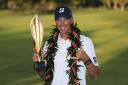 HONOLULU, HI - JANUARY 13:  Matt Kuchar of the United States poses with the trophy after winning the Sony Open In Hawaii at Waialae Country Club on January 13, 2019 in Honolulu, Hawaii.  (Photo by Sam Greenwood/Getty Images).