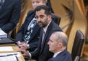 First Minister Humza Yousaf sat next to Health Secretary Michael Matheson at FMQs on Thursday