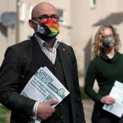 Scottish Green Party co-leaders Patrick Harvie and Lorna Slater on the local election campaign trail in Edinburgh. Picture date: Wednesday March 24, 2021. PA Photo. See PA story ELECTION Scotland. Photo credit should read: Andrew Milligan/PA Wire.