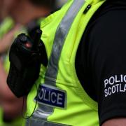 Police hunting knife-wielding man who stole cash from Edinburgh shop