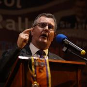 DUP leader Sir Jeffrey Donaldson speaks during an anti Northern Ireland Protocol rally and parade in late March