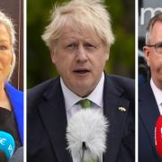 From left: Sinn Fein's Michelle O'Neill, whose party became the largest at Stormont after the recent elections, UK Prime Minister Boris Johnson, and DUP leader Jeffrey Donaldson