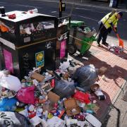 Council workers have begun the clean-up operation in Glasgow as union members return to work following the strike. Picture: PA/Andrew Milligan