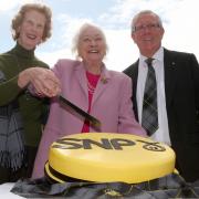 Winnie Ewing (centre) with former MSP Bruce Crawford (right) and party member Wilma Murray