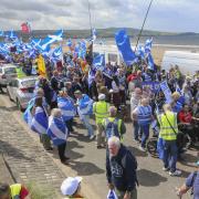 Failure to promote independence marches does not equate to disapproval of them
