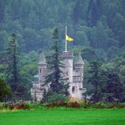 The Royal Banner of Scotland above Balmoral Castle is flown at half mast following the announcement of the death of Queen Elizabeth in September 2022