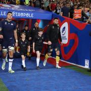 Rhys Edwards walked the Scotland team out for their game against Romania