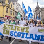First Minister of Scotland Humza Yousaf taking part in a Scottish independence march in Edinburgh