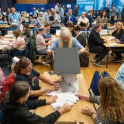 Votes are counted in the count hall at the South Lanarkshire Council Headquarters in Hamilton for the Rutherglen and Hamilton West by-election