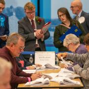 Votes are counted in the count hall at the South Lanarkshire Council Headquarters in Hamilton for the Rutherglen and Hamilton West by-election.