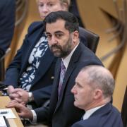 First Minister Humza Yousaf sat next to Health Secretary Michael Matheson at FMQs on Thursday