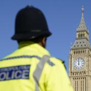 File photograph of a police officer outside the Palace of Westminster