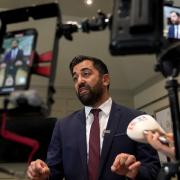First Minister of Scotland and SNP leader Humza Yousaf speaks to the media