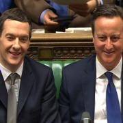 George Osborne and David Cameron listen as Ed Miliband responds to the Budget