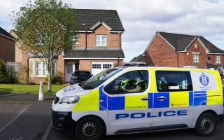 A police patrol outside former SNP chief executive Peter Murrell's house after he was charged in connection with embezzlement of SNP funds