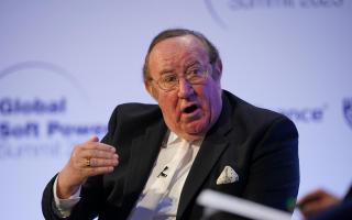 Andrew Neil has been called out for sharing a 'distasteful' cartoon