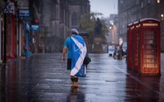 A Yes supporter photographed walking after the results of the 2014 referendum were announced
