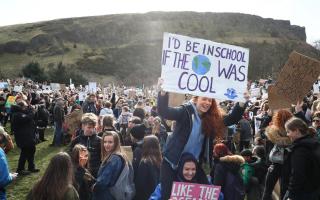 School children hold a protest about climate change outside the Scottish Parliament