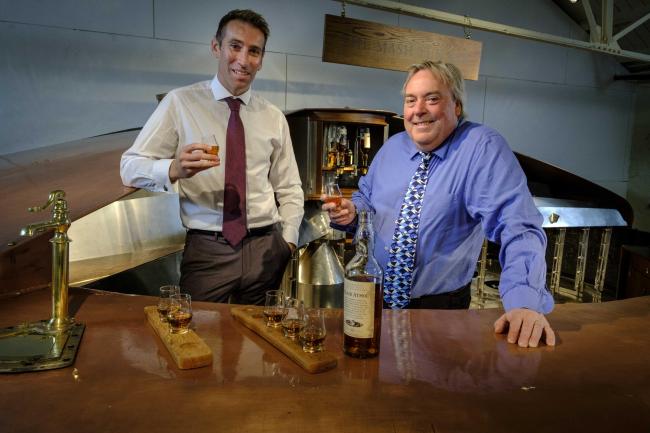 Diageo Scotland director Ewan Andrew and Malcolm Roughead, VisitScotland chief, at the Blair Atholl distillery's new whisky tasting bar