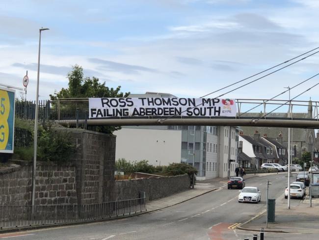 Ross Thomson trolled by constituents with banner calling him a 'gype' | The  National
