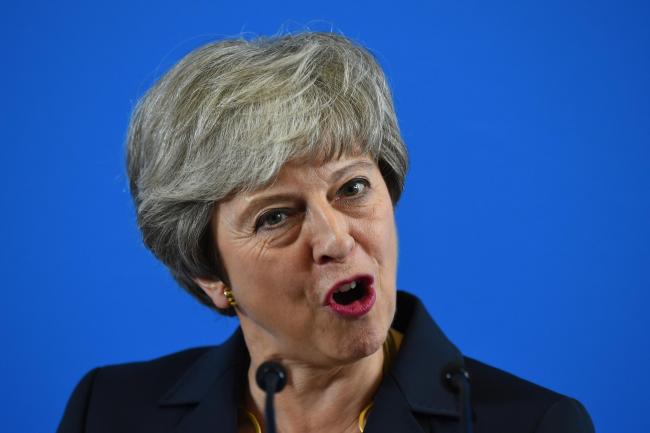 Theresa May has been urged to apologise for refusing hundreds of child trafficking victims the right to stay in the UK