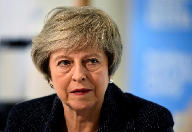 Theresa May urged the new PM to get a Brexit deal