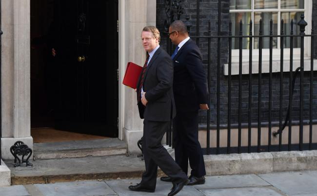 The economic devastation of a no-deal Brexit would merely amount to a few bumps in the road, according to Alister Jack (pictured left with Tory chair James Cleverly)