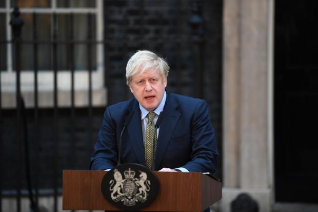 The National: Boris Johnson addresses the nation from the steps of Downing Street