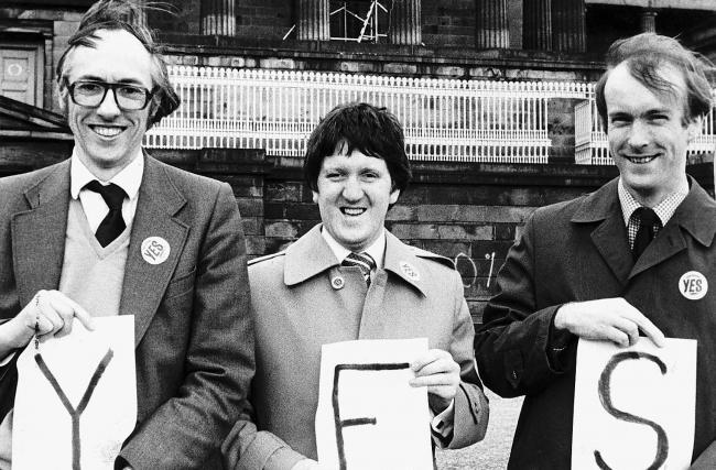Left to right: Donald Dewar, George Robertson and John Home Robertson standing outside the Royal High School Assembly building in Edinburgh campaigning for a Yes vote in the devolution referendum of 1979