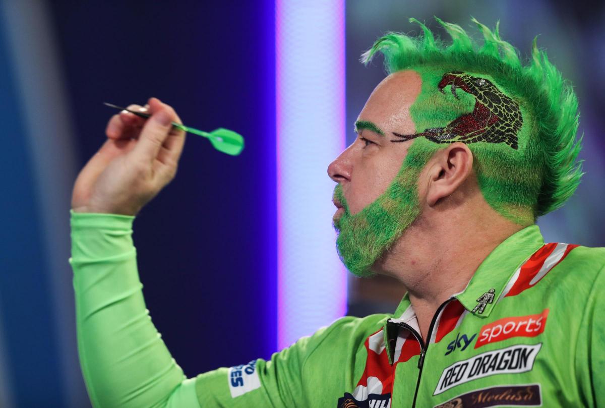 In pictures: Scots darts star Peter Wright opens World defence dressed as The Grinch | The National