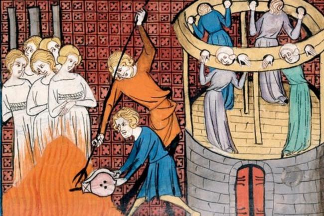 Medieval image of women being burned, and others held in stocks, after being labelled 'witches'. Photo: Public Domain