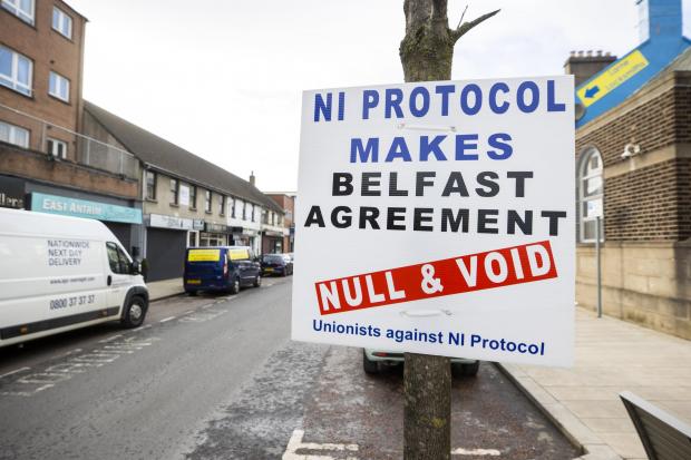 The National: A sign by Unionists against the NI Protocol in Larne