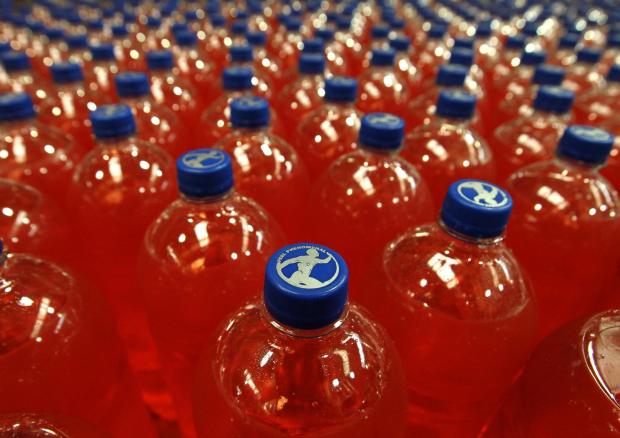 The National: File photo dated 9/9/2011 of bottles of Irn Bru in the production hall at AG Barr's Irn Bru factory in Cumbernauld. The Scottish drinks company has said it is seeing encouraging trading as people return to restaurants, pubs and bars around the UK.