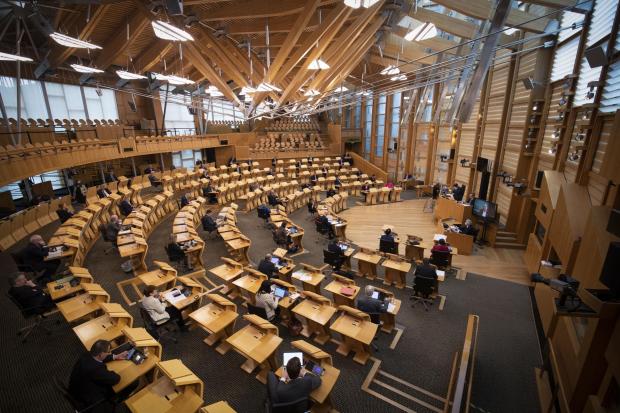 The National: The chamber of the Scottish Parliament during a debate 