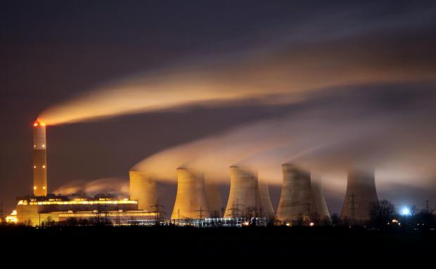 The National: RETFORD, UNITED KINGDOM - NOVEMBER 30:  The coal fuelled Cottam power station generates electricity on November 30, 2009 in Retford, Nottinghamshire, United Kingdom. As world leaders prepare to gather for the Copenhagen Climate Summit in December, the