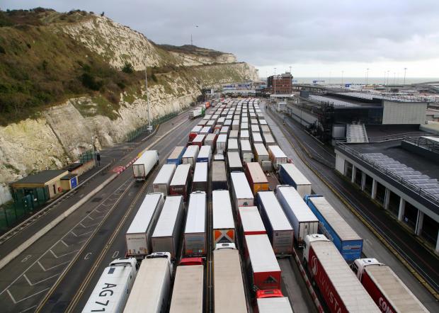 The National: Lorries queue to enter The Port of Dover. Image: Gareth Fuller/PA