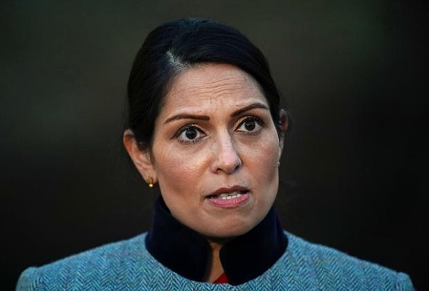 The National: Priti Patel is seeking to raise the length of prison sentences for those arriving to the UK 'illegally'