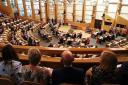 MSPs in the Holyrood chamber to mark the 20th anniversary of devolution in 2019