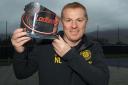 Neil Lennon lifts the manager of the month award for November