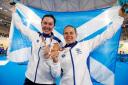 Scotland's Katie Archibald (left) celebrates with her silver medal and Neah Evans with her bronze medal at the 2018 Commonwealth Games