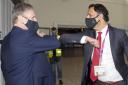 UK Labour leader Keir Starmer greets Scottish Labour leader Anas Sarwar at Edinburgh airport