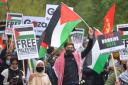 Demonstrators walk through Hyde Park as they make their way to the Israeli embassy in London, during a march in solidarity with the people of Palestine in May 2021
